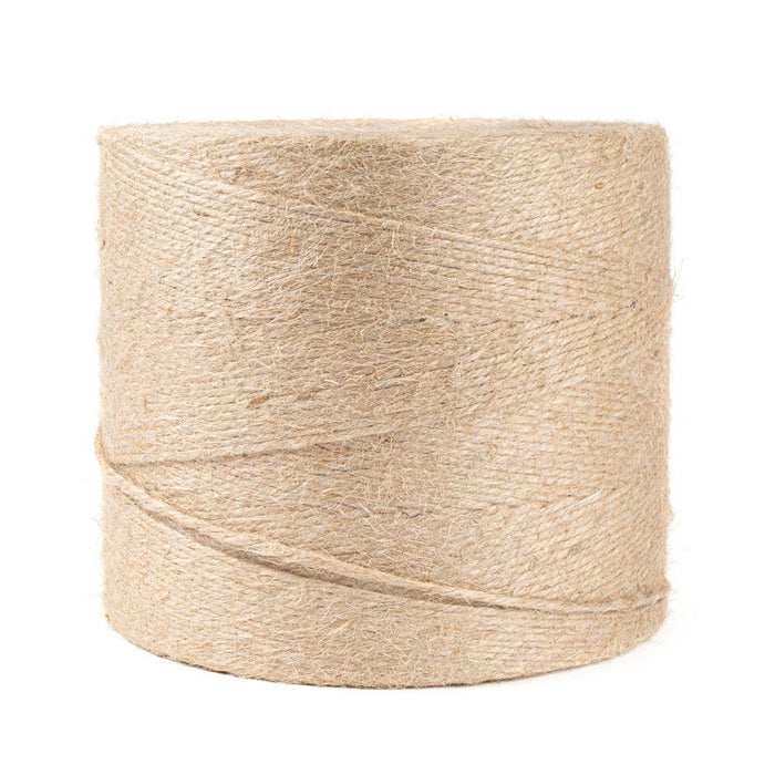 Corde en jute torsadée Ø 4 mm de couleur dorée chaude sur fond de bois